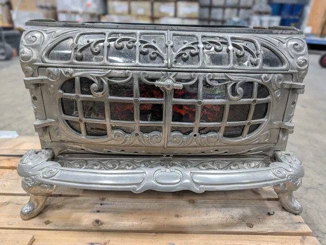 Decorative metalwork around the electric insert