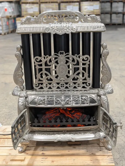 Open doors and illuminated electric logs