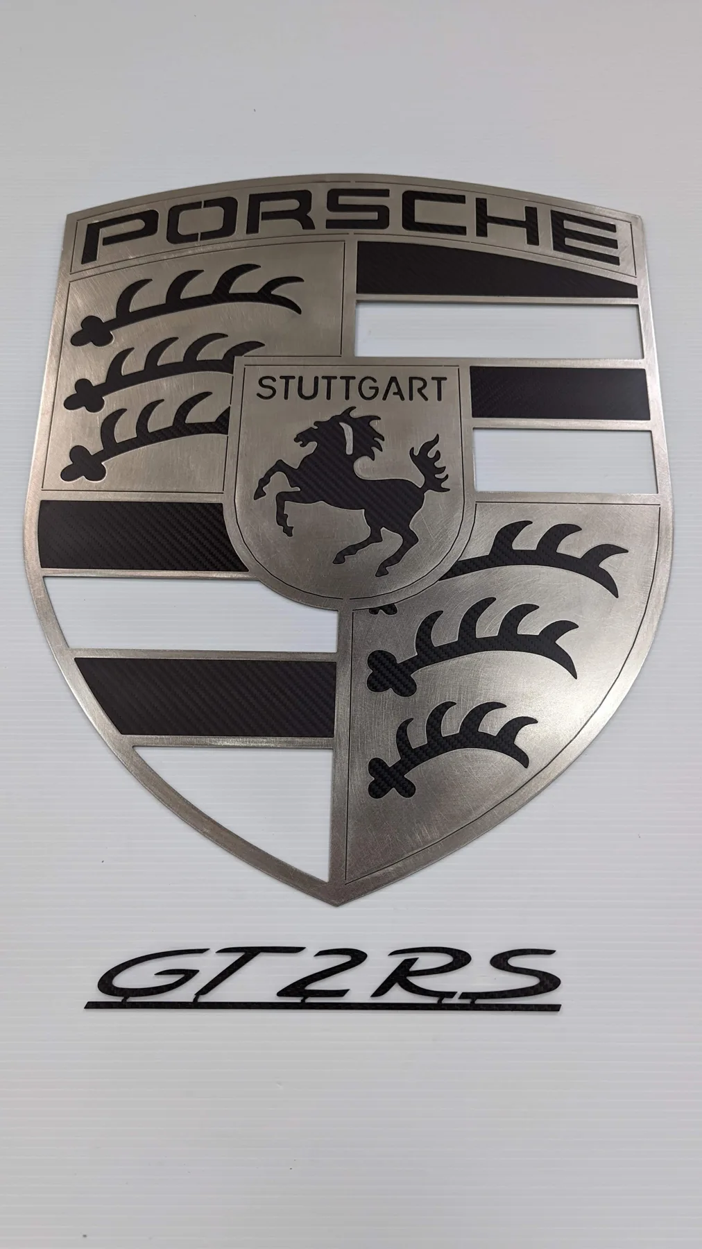 The Porsche crest, reimagined